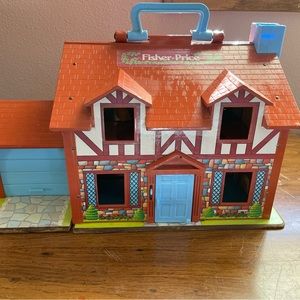 Vintage Fisher Price Little House 1980 includes two characters